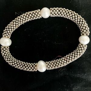 Stretchy Silver bead  and pearl bracelet